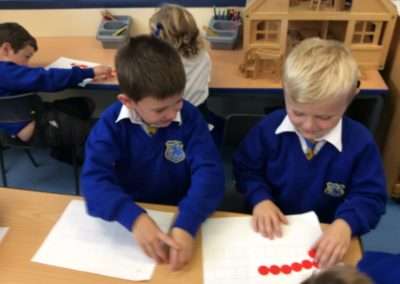 boys counting dots